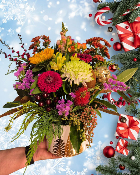 Christmas themed ceramic pot arrangement