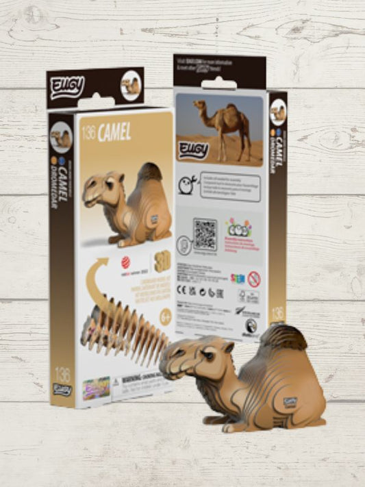 Camel 3d puzzle with packaging on a wooden surface
