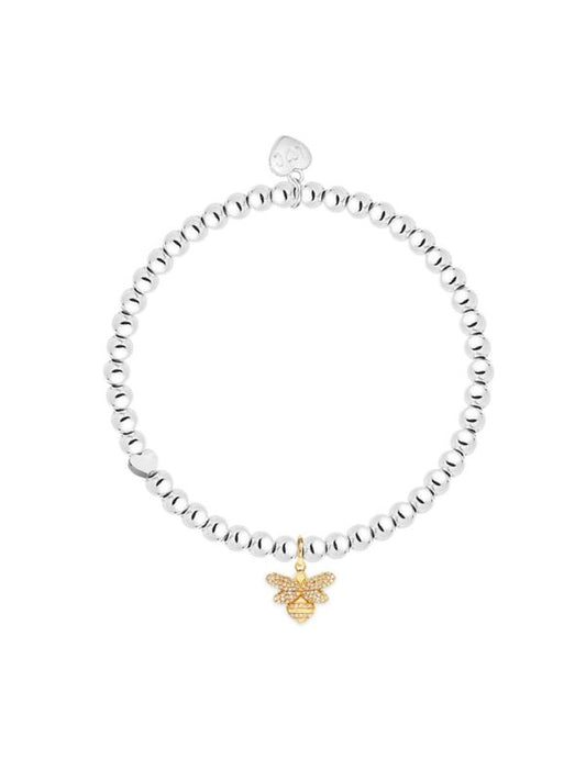 Silver beaded bracelet with a gold bee charm on a white background