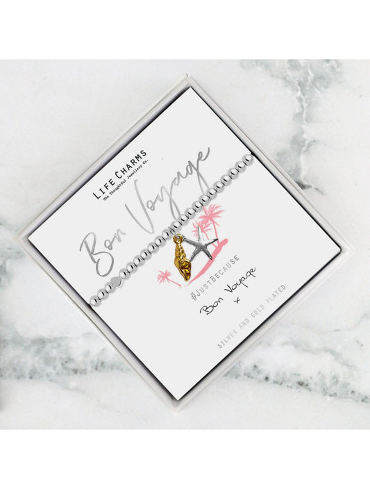 Jewelry box with 'Life Charms' branding on a marble surface