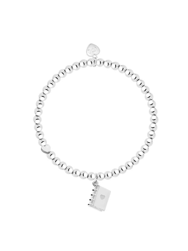 Silver beaded bracelet with a small lock charm on a white background