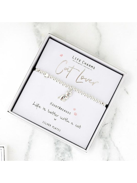 Life Charms cat lover bracelet in a branded box on a marble surface
