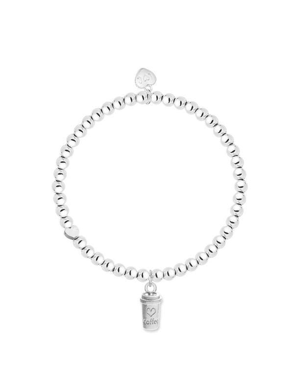 Silver bracelet with a heart-shaped tag on a white background