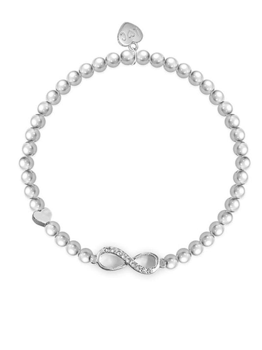 Pearl bracelet with silver infinity charm on a white background