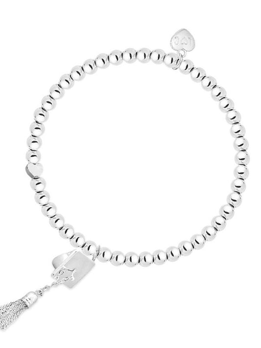 Silver beaded bracelet with tassel on a white background