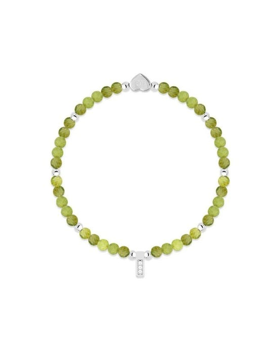 Green beaded bracelet with a silver clasp on a white background