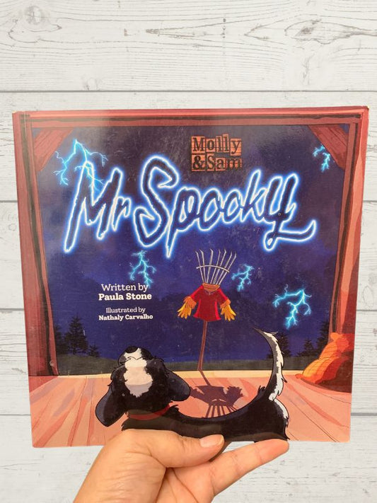 kids book Mr Spooky on a wooden backgroud