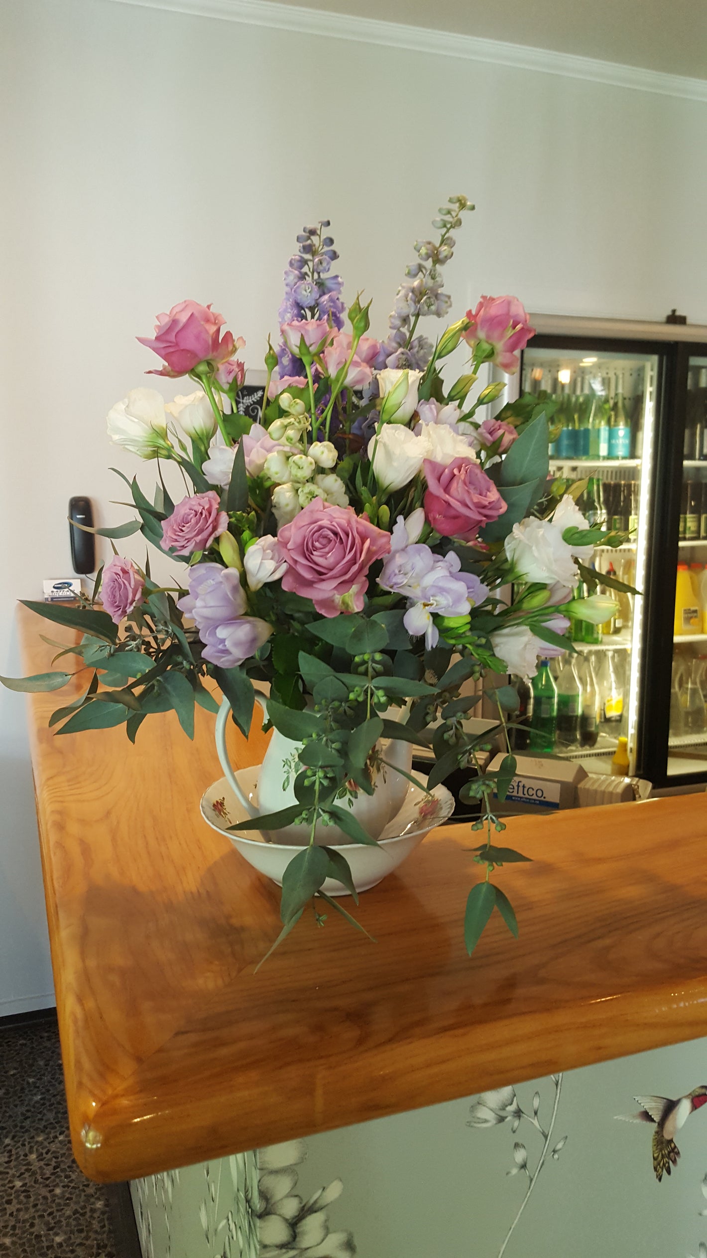 Bouquet of flowers on a wooden table with a blurred background