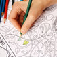 coloring-in book with coloured pencils and a hand, with vines and leaves