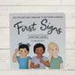 Cover of the book 'First Signs - Everday words 2' featuring illustrations of three diverse children making sign language gestures, with the title and author's name 'Anna Brockett' displayed.