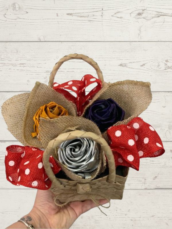 Harakeke flower in kete basket