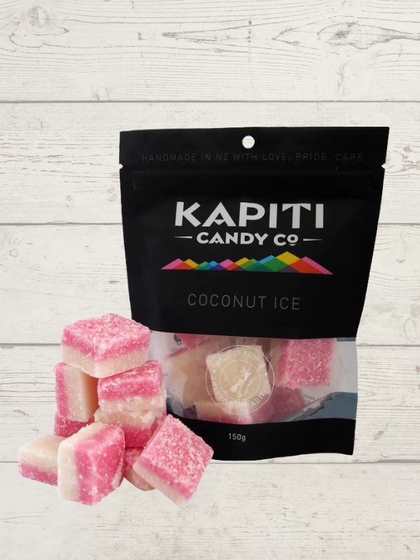 pink and white candy with packaging, Kapiti Candy co on a wooden surface
