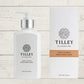 A collection of Tilley body wash bottles in various scents, including lavender, vanilla, and patchouli, with packaging that displays the scent name and minimalist design.