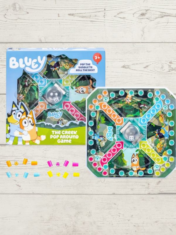 image of bluey around the creek game s with the box with bluey and bandit on it 