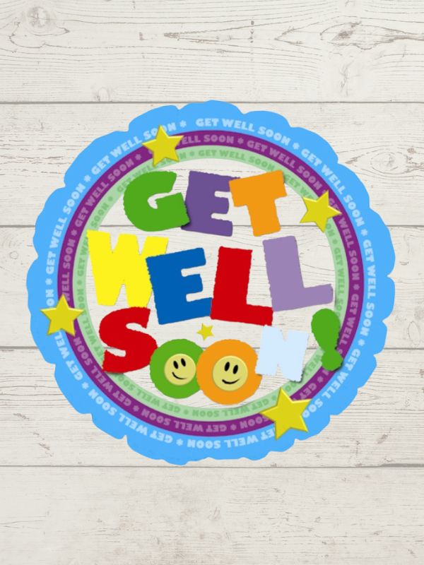 A round balloon with 'GET WELL SOON' text in colorful letters, surrounded by stars and a smiley face on a wooden background.