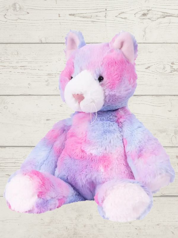 A plush toy resembling a marshmallow cat with a pink and purple color scheme, featuring embroidered details on the face and a fluffy texture.