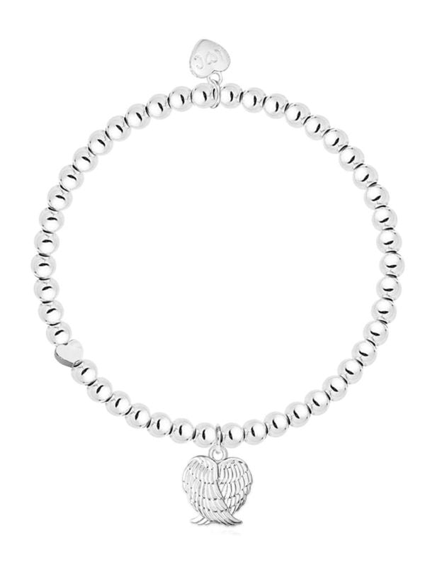 Silver bracelet with a heart-shaped charm on a white background