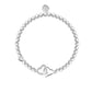 Pearl bracelet with silver heart charms on a white background