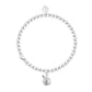 Silver bracelet with a small apple charm on a white background