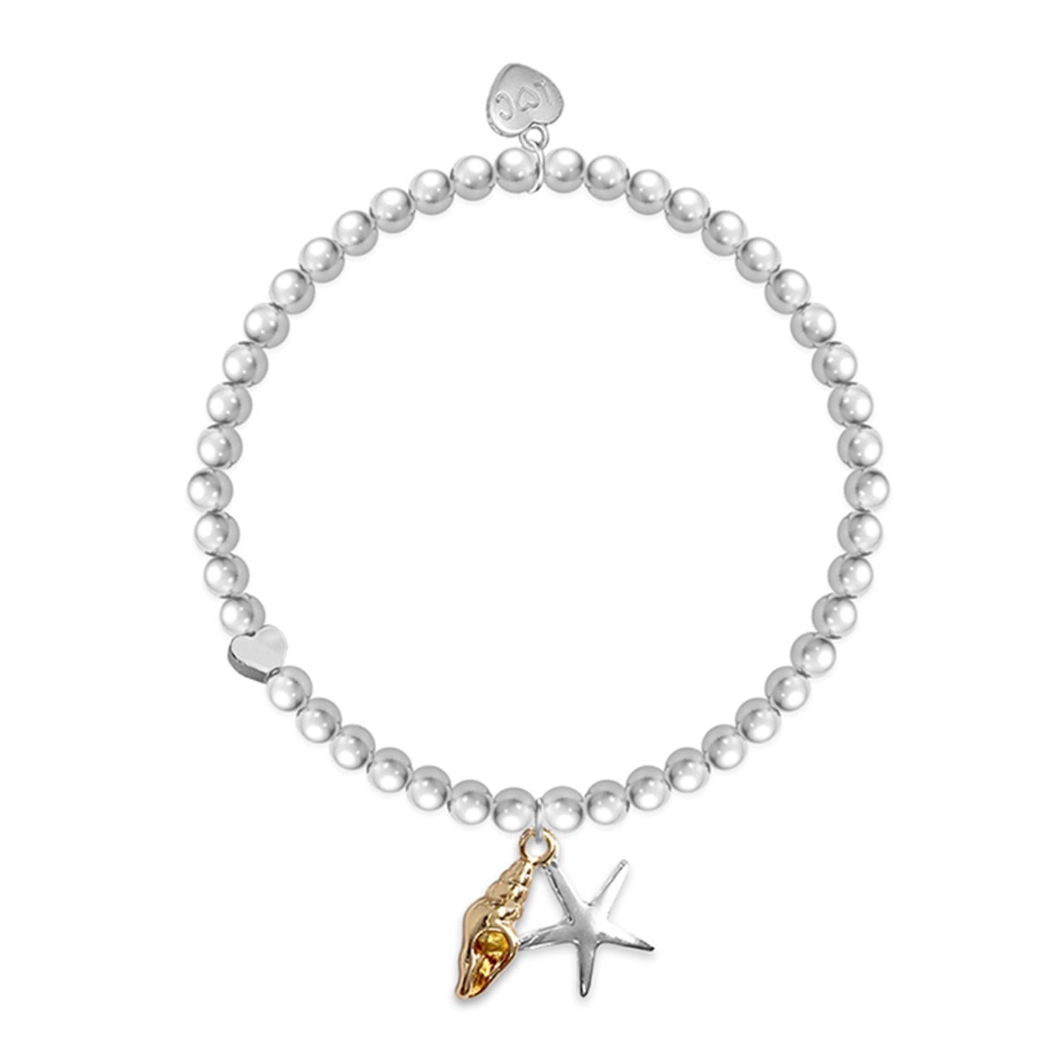 Pearl bracelet with starfish and shell charm on a white background