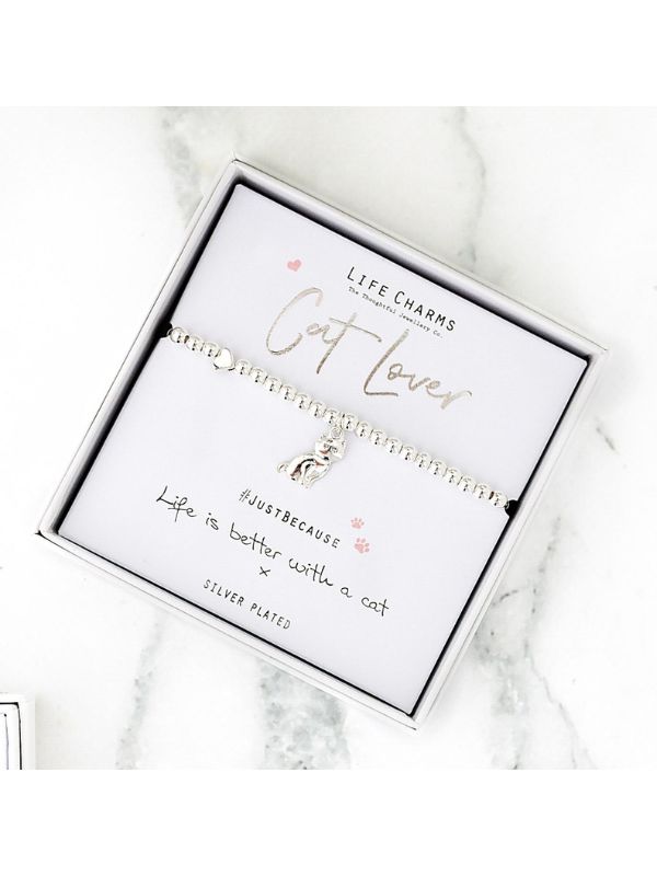 Life Charms cat lover bracelet in a branded box on a marble surface