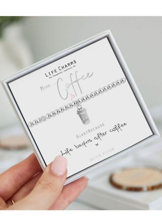 Bracelet set with coffee-themed charm in a box labeled 'Life Charms'.
