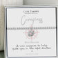 Life Charms compass bracelet packaging with text on a white background