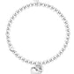 Silver beaded bracelet with a heart charm on a white background