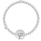 Pearl bracelet with a tree-shaped clasp on a white background