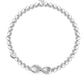 Pearl bracelet with silver infinity charm on a white background