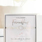 Bracelet on a card with 'Life Charms' branding and 'Friendship' text, featuring silver plating.