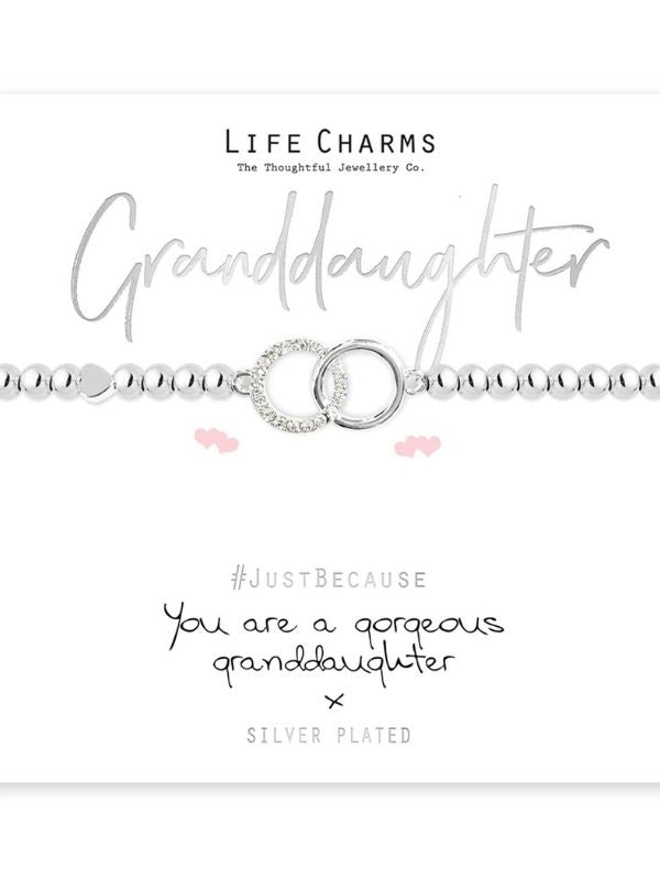 Silver bracelet with heart charm on a white background, featuring 'Life Charms' branding.