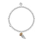 Pearl bracelet with a gold and silver charm on a white background