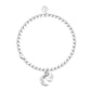 Silver bracelet with a moon charm on a white background