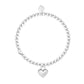 Silver bracelet with a heart charm on a white background