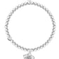 Pearl bracelet with a silver flower charm on a white background