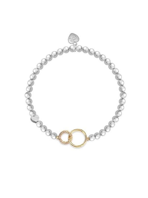 Pearl bracelet with gold clasp on a white background