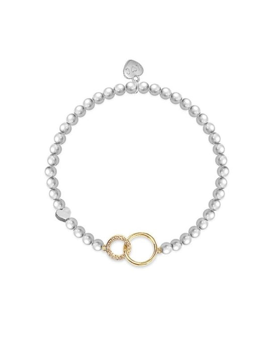 Pearl bracelet with gold clasp on a white background