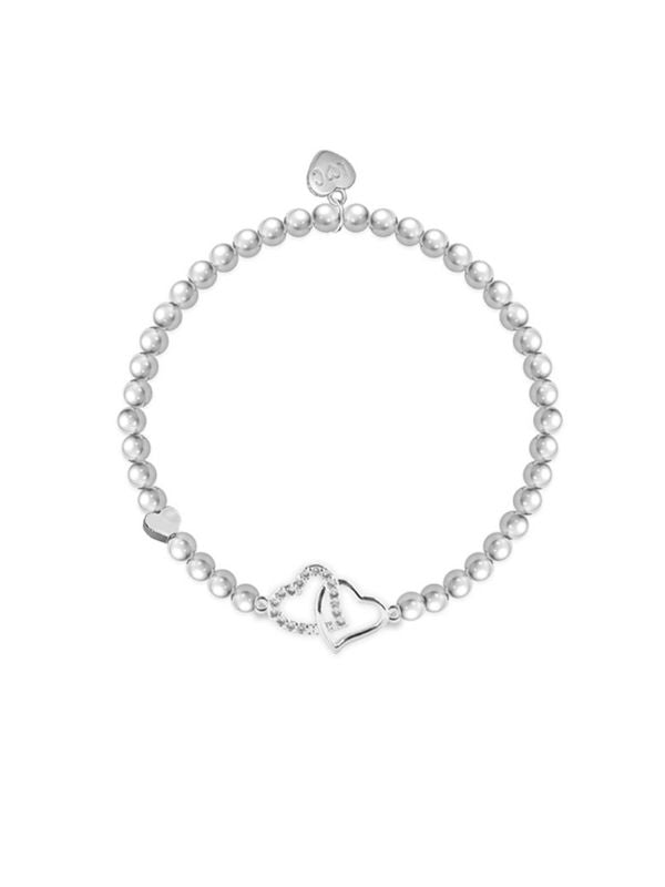 Pearl bracelet with silver heart charms on a white background