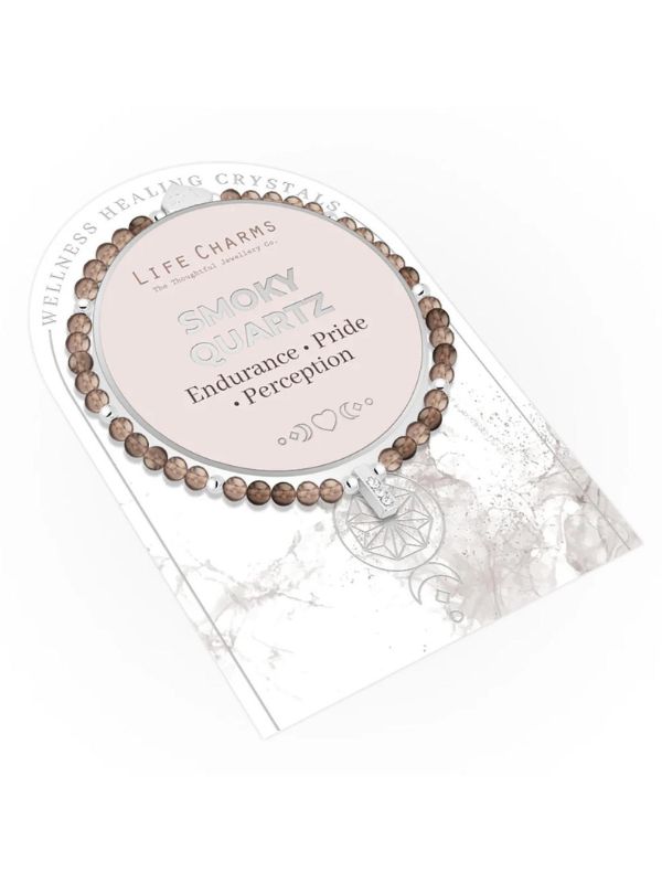Smoky quartz bracelet with packaging on a white background