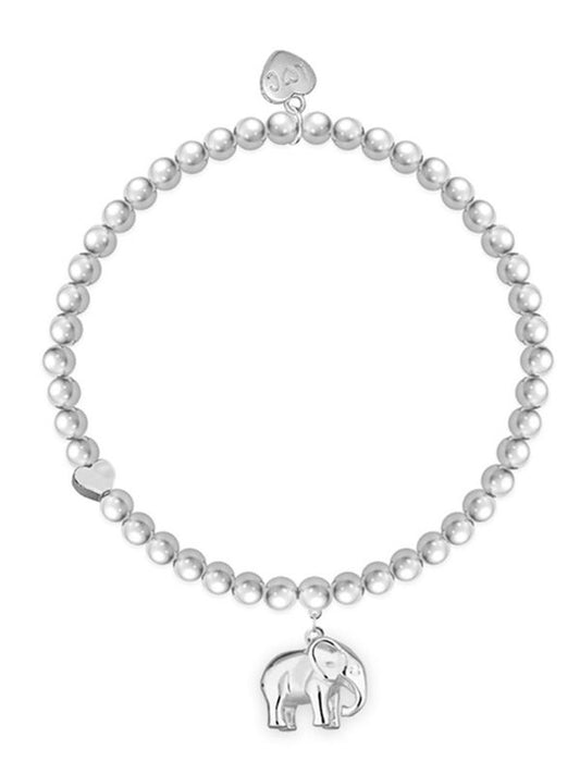 Pearl bracelet with silver elephant charm on a white background