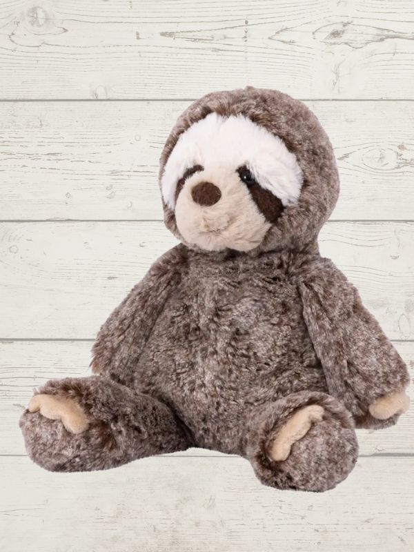 A plush toy resembling a marshmallow sloth with a face, made from soft fabric, designed by Mary Meyer.