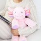 Person holding a pink plush toy with a neutral background