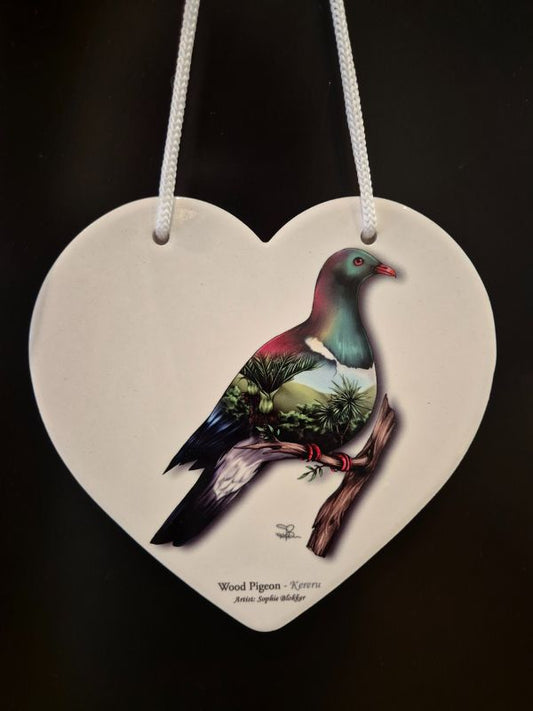 white heart with kereru bird, nz native bush scene inside bird