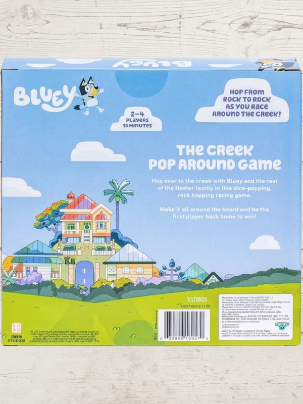 back of the bluey game, shows a house and bluey on a wooden background