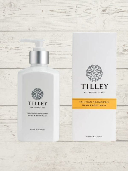 A collection of Tilley body wash bottles in various scents, including lavender, vanilla, and patchouli, with packaging that displays the scent name and minimalist design.