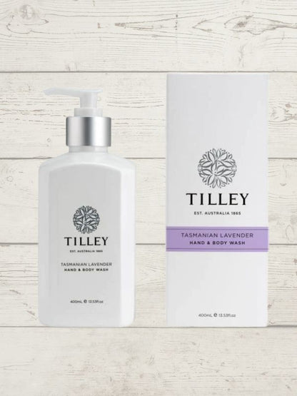 A collection of Tilley body wash bottles in various scents, including lavender, vanilla, and patchouli, with packaging that displays the scent name and minimalist design.