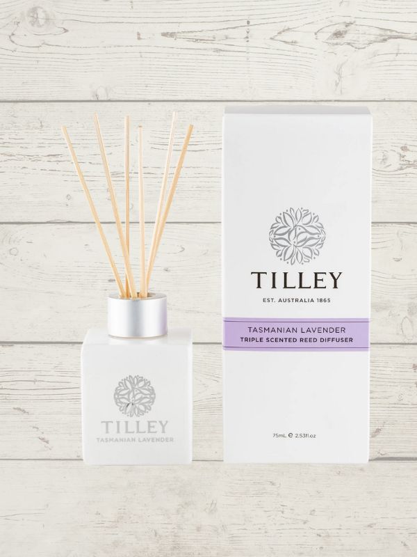 A Tilley brand reed diffuser with a white bottle and beige reeds, accompanied by a packaging box with the product name and branding visible.