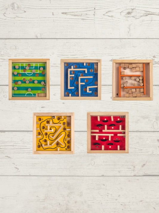 Five wooden maze toys in different colors on a light wooden surface