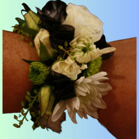 White and black corsage